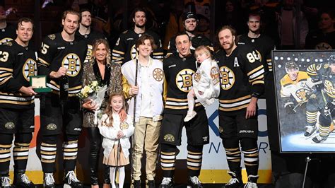 Marchand rocks gold jacket to 1,000th game ceremony